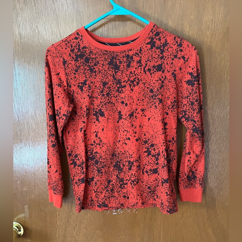 Red and black long sleeve shirt. Size 8/10
